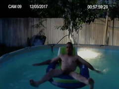 Dad caught swimming naked on security cam